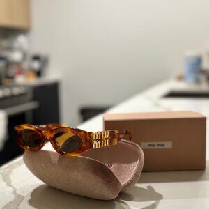 MIU MIU Women's Sunglasses MU A03S